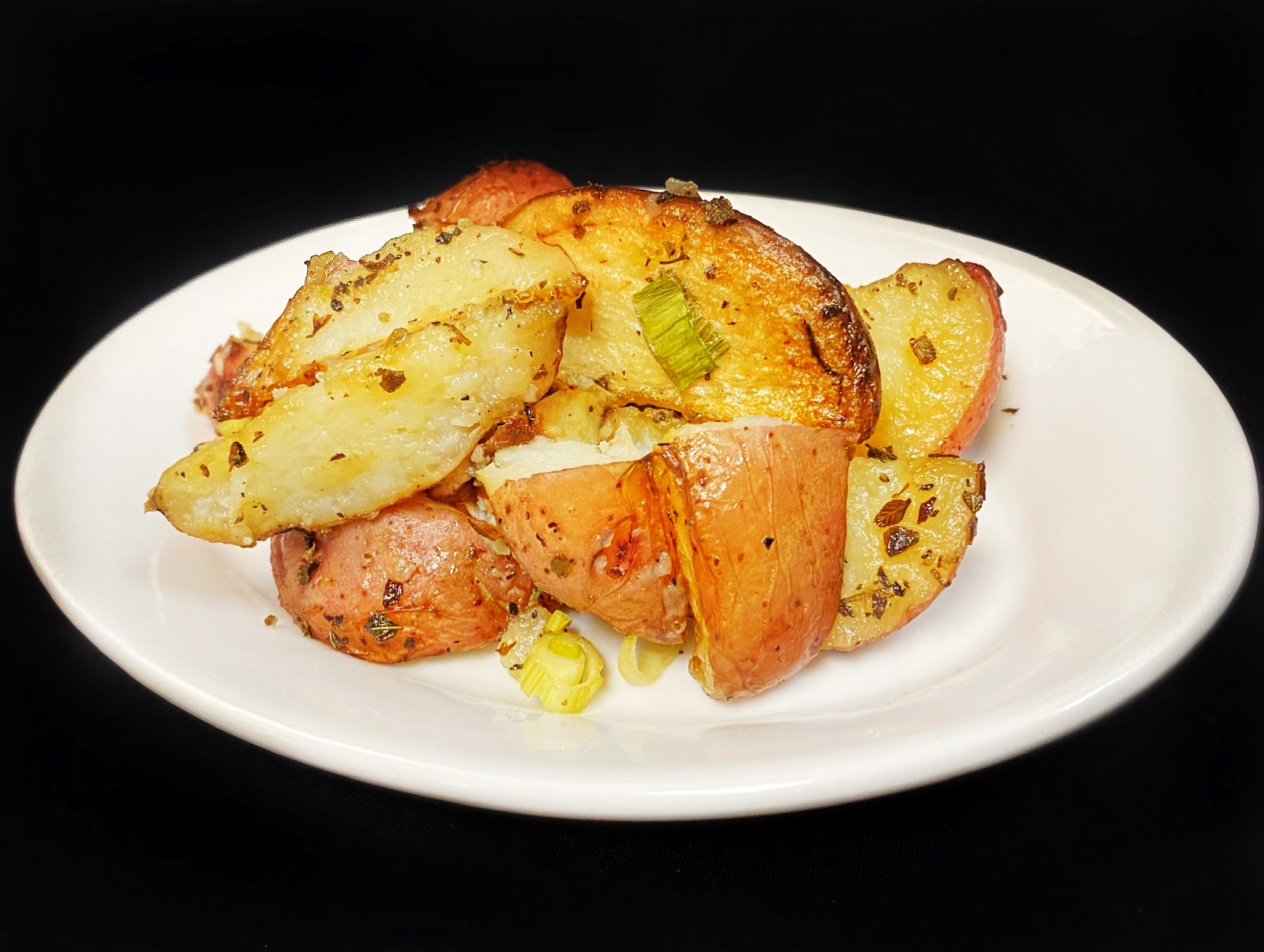 Order Roasted Potatoes food online from Agora Churrascaria store, Irvine on bringmethat.com