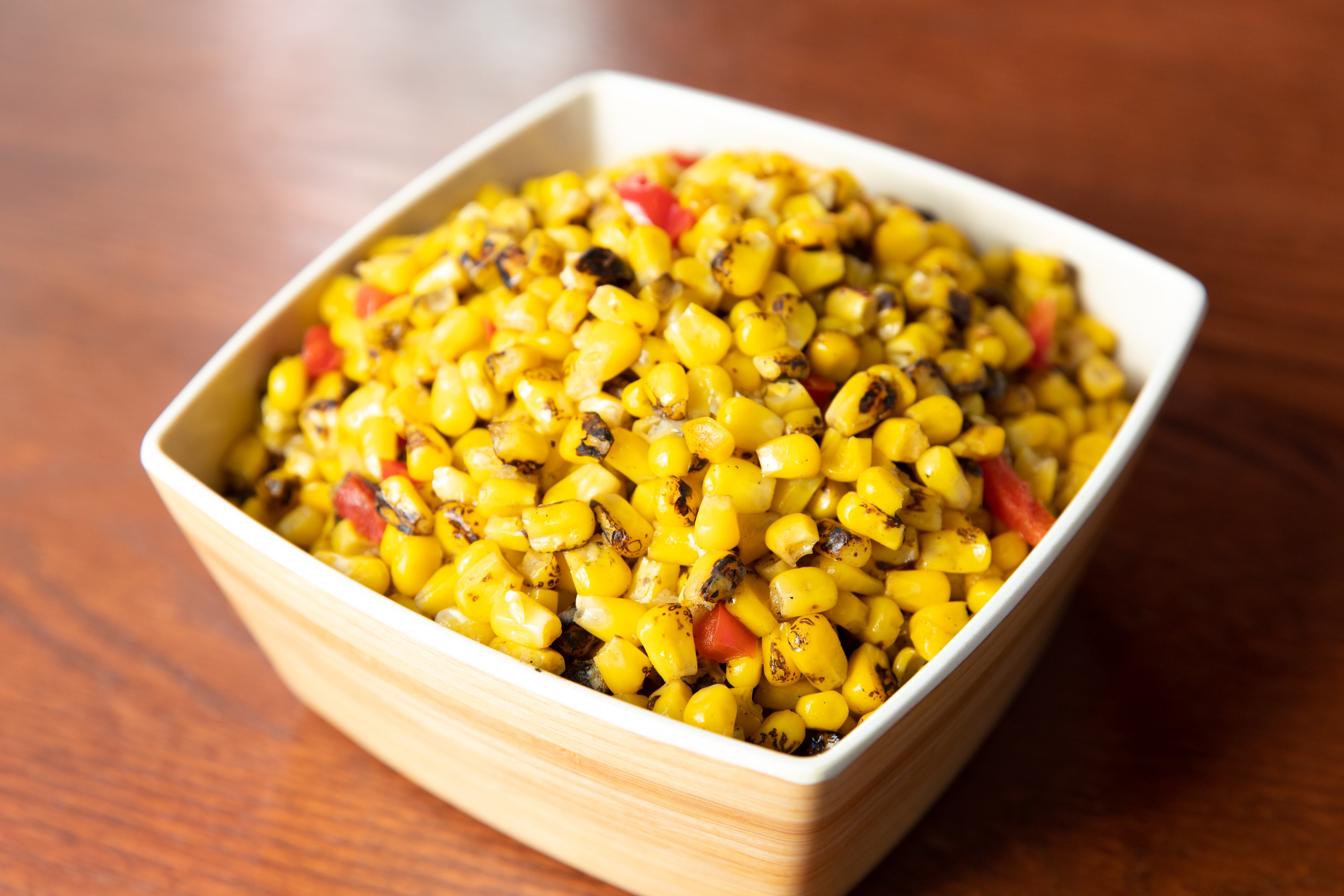 Order Fire-Roasted Corn food online from Smokey Bones Barbeque and Grill store, Mentor on bringmethat.com