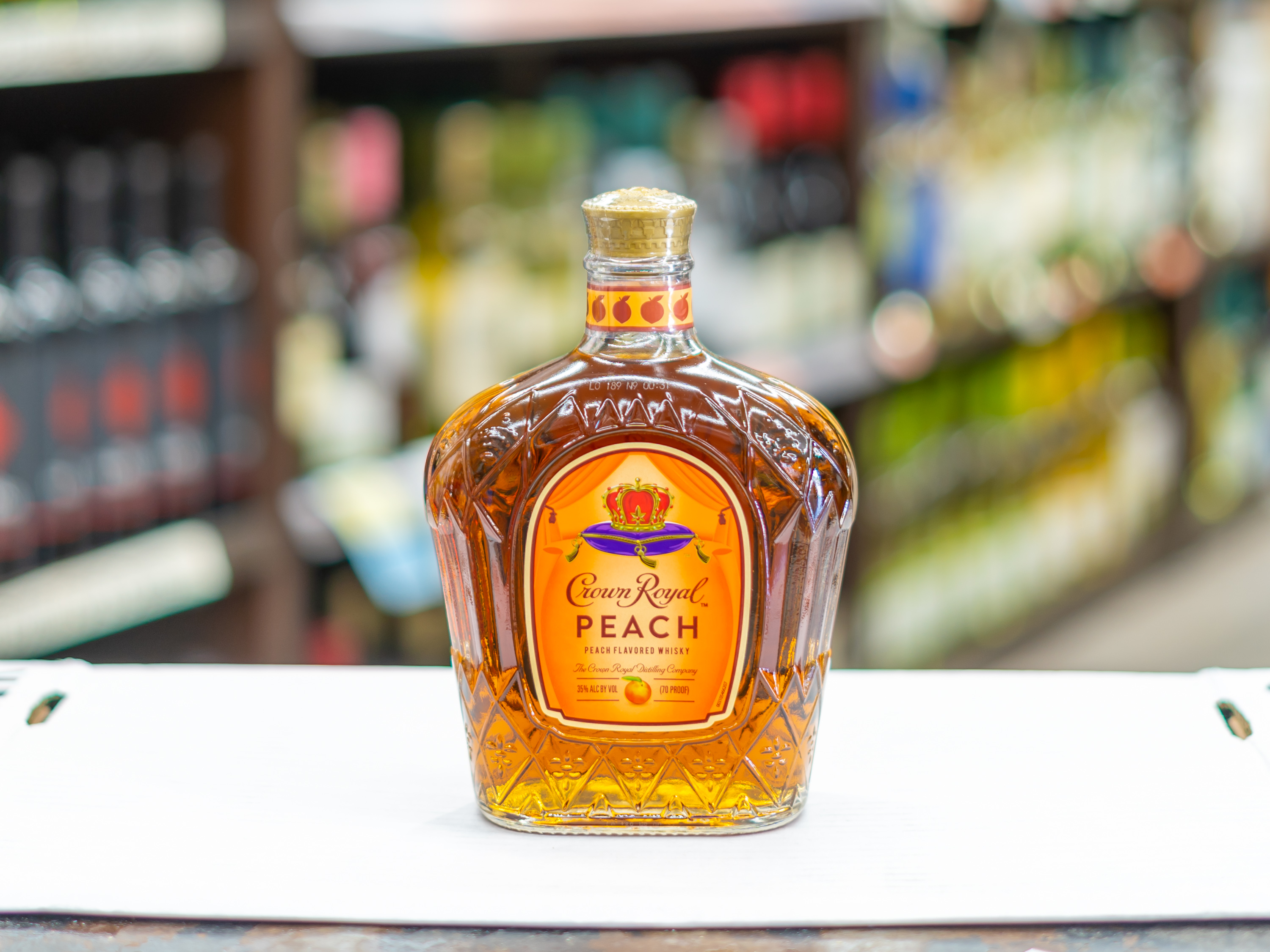 Order 750 ml. Crown Royal Peach Flavored Whiskey food online from 5 Star Market and Liquor store, La Mesa on bringmethat.com