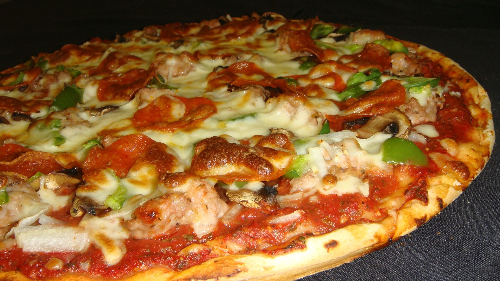 Order Thin Crust Cheese Pizza food online from Capone's Pizzeria store, Bloomingdale on bringmethat.com