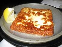 Order SAGANAKI "OPA" food online from Leo's Coney Island store, Sterling Heights on bringmethat.com