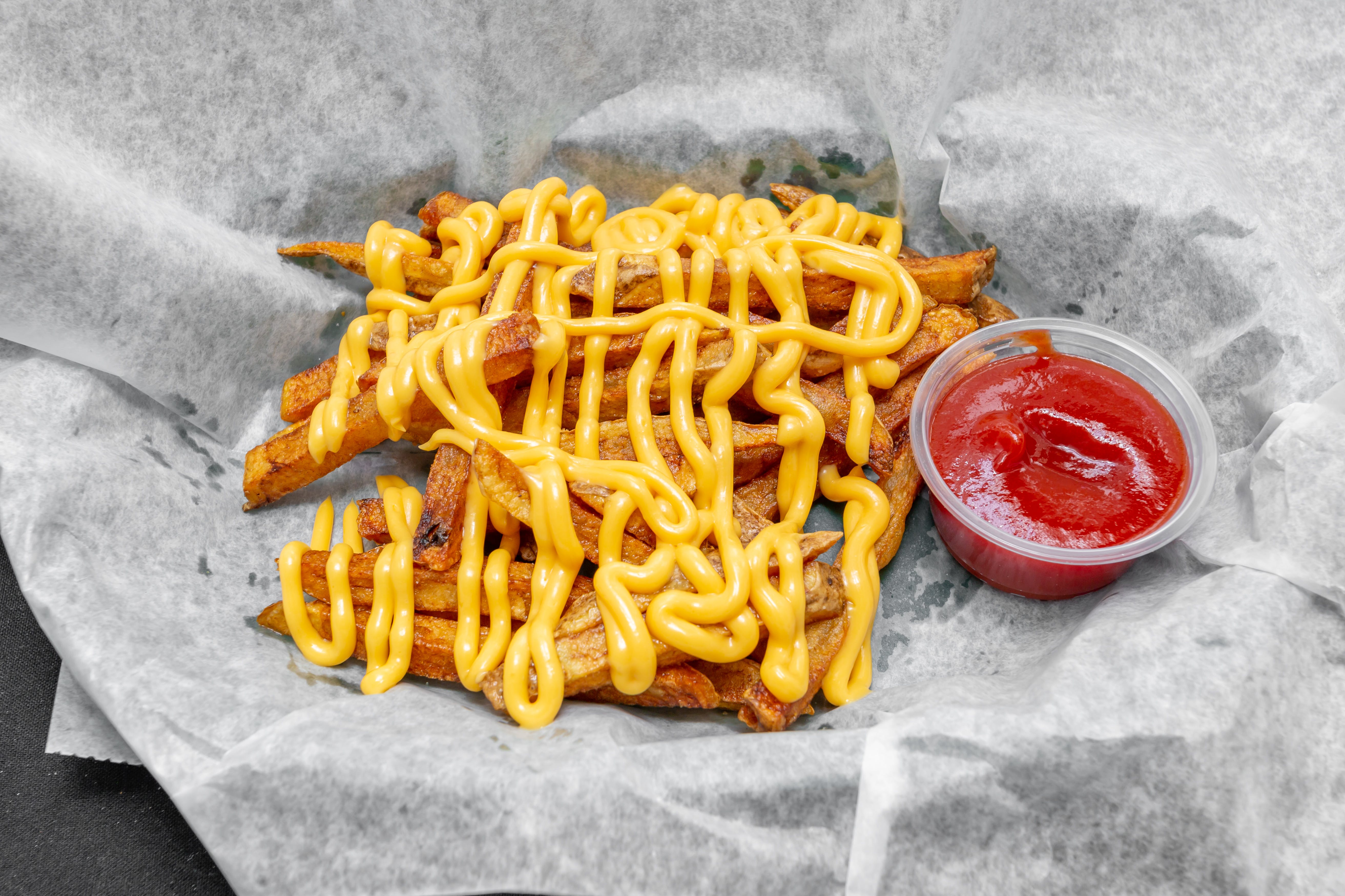 Order Cheese Fries - Small food online from Pujols Pizzeria store, Bethlehem on bringmethat.com
