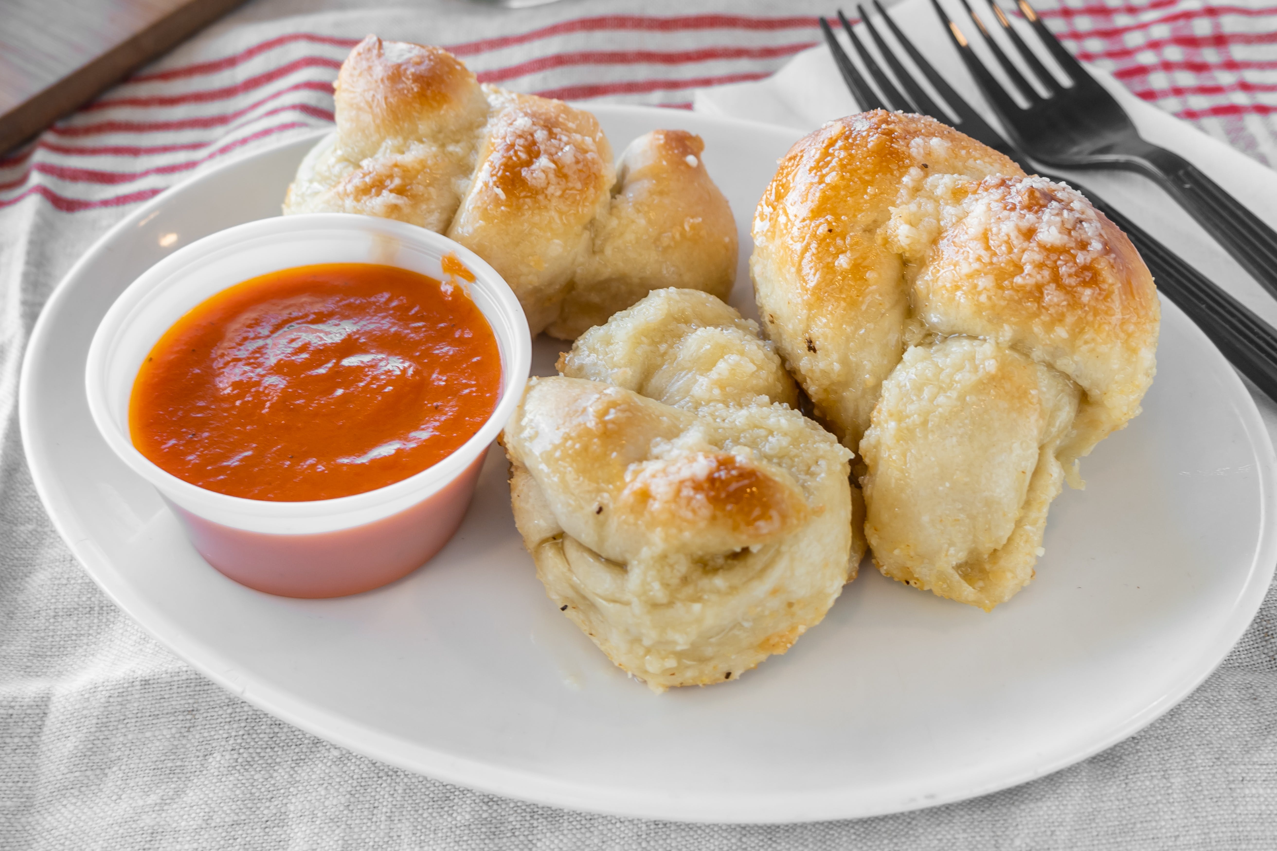 Order Garlic Knots - 6 Pieces food online from Divincenzo Pizza store, Cinnaminson on bringmethat.com