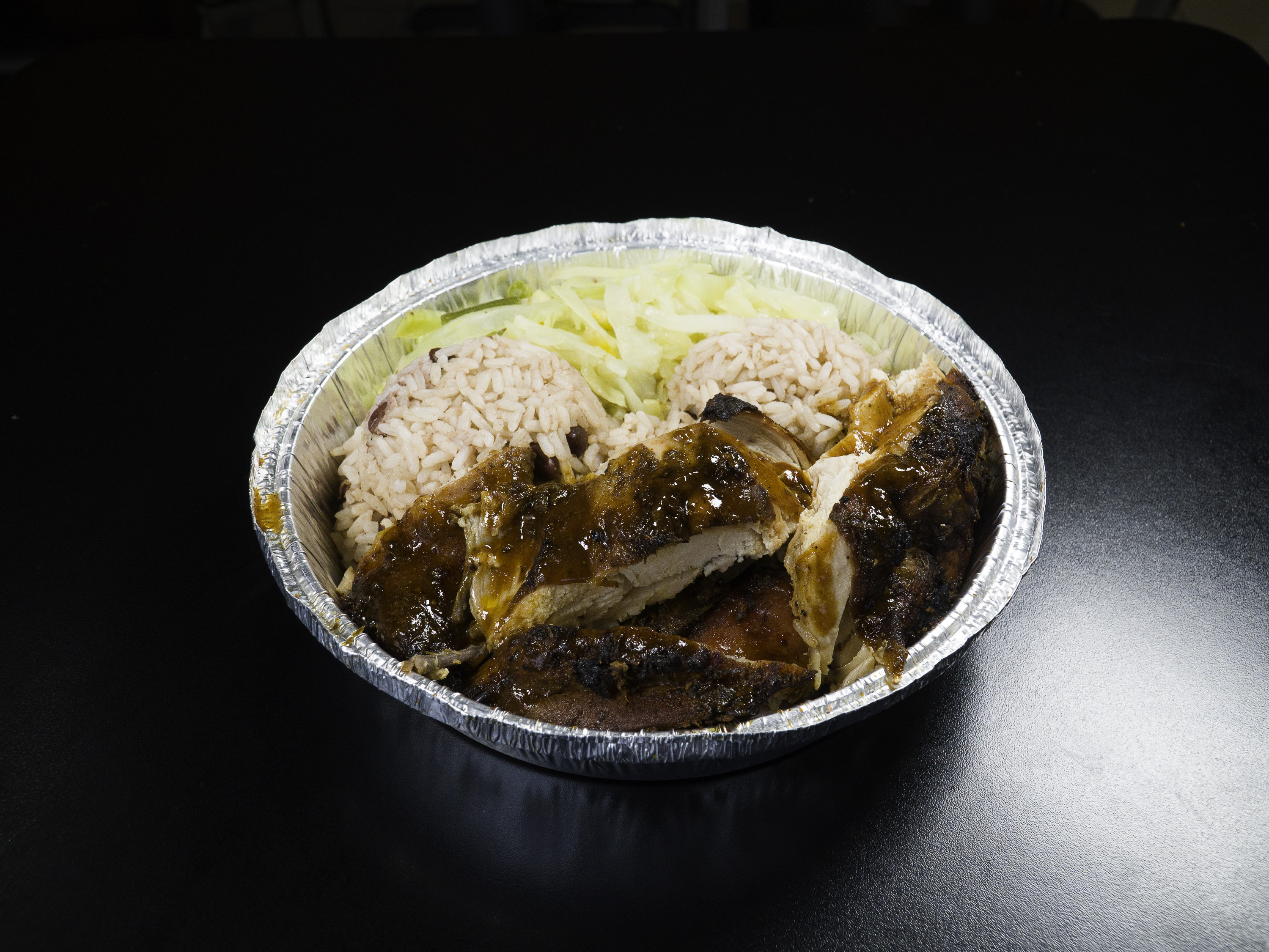 Order Large Jerk Chicken food online from Tropicana Eatery store, Silver Spring on bringmethat.com