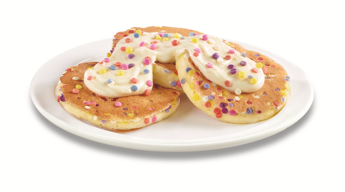 Order Jr. Birthday Cake Pancakes food online from Denny store, Henderson on bringmethat.com