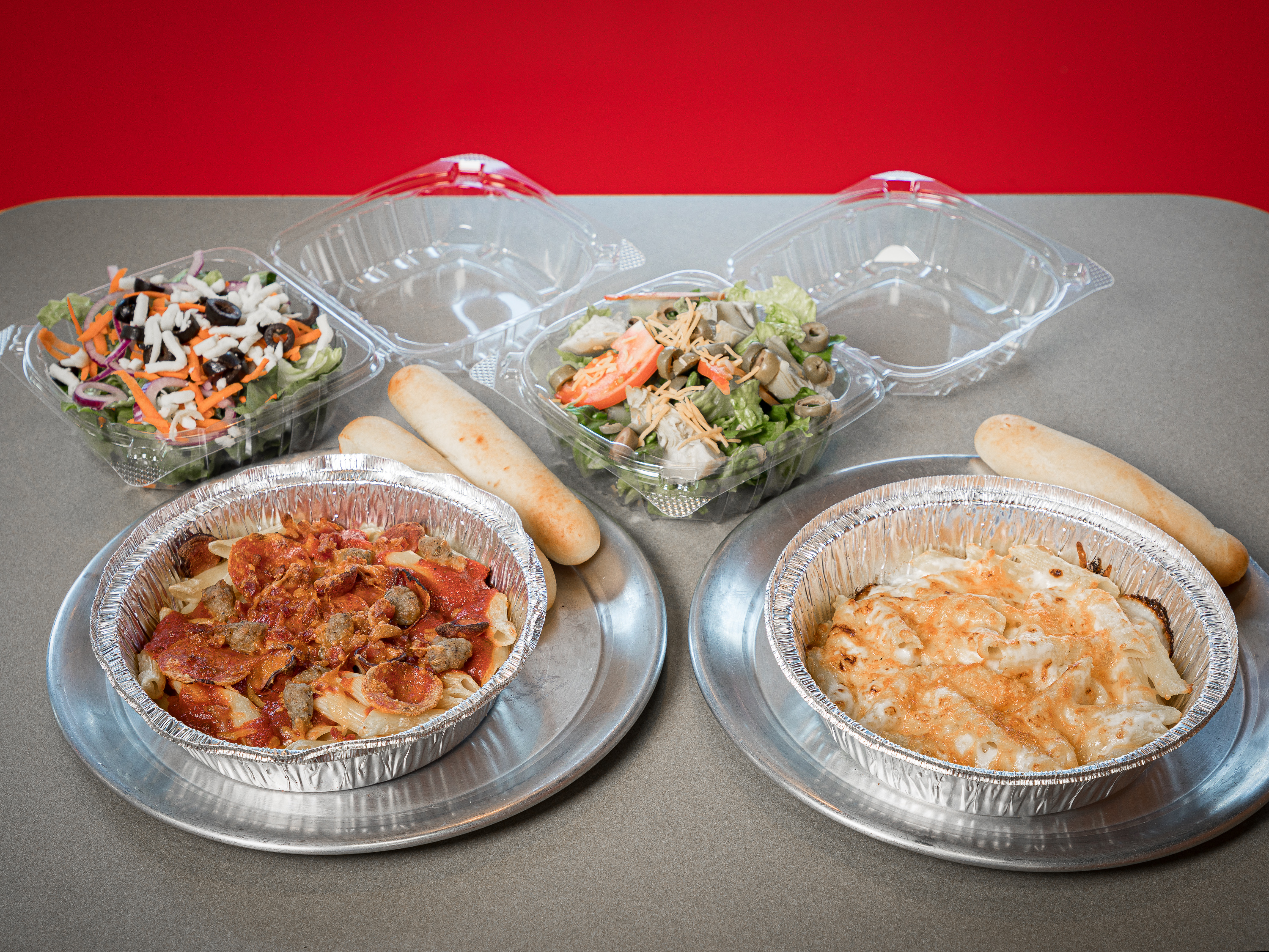 Order 2 Penne Pasta and 2 Side Salad food online from Top That! Sub store, Tulsa on bringmethat.com