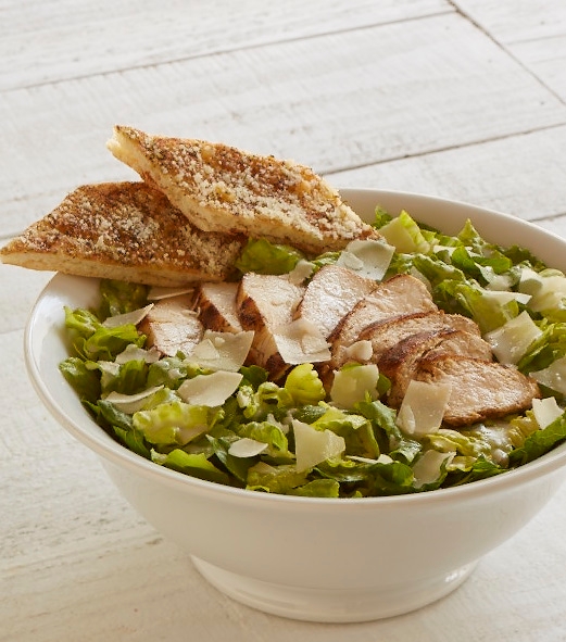 Order CHICKEN CAESAR food online from Uncle Maddio's store, Charlotte on bringmethat.com