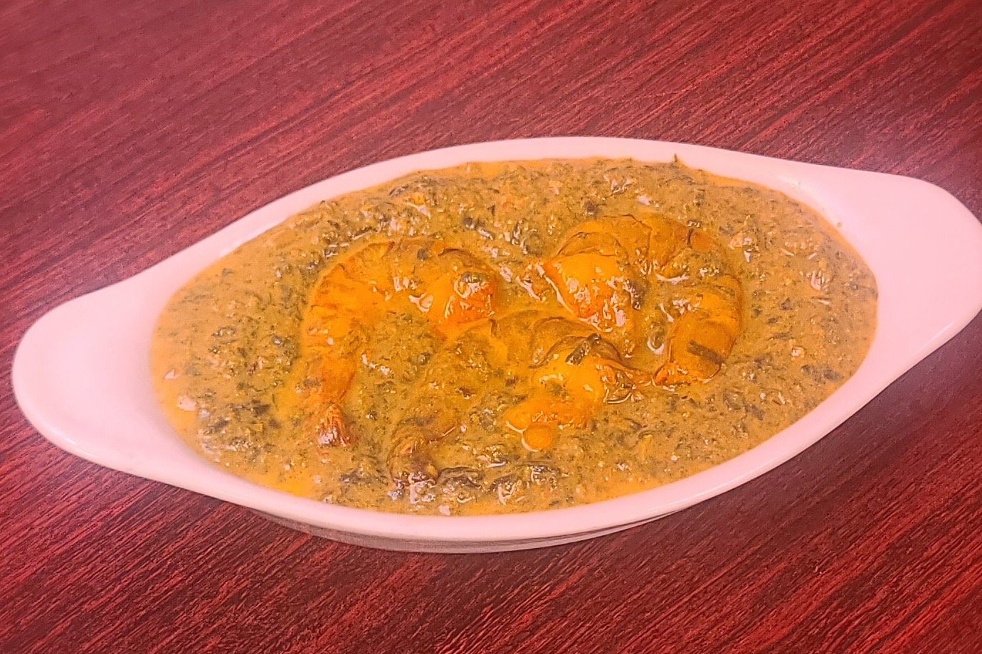 Order Shrimp Saag Curry food online from Royal Indian Cuisine store, San Francisco on bringmethat.com