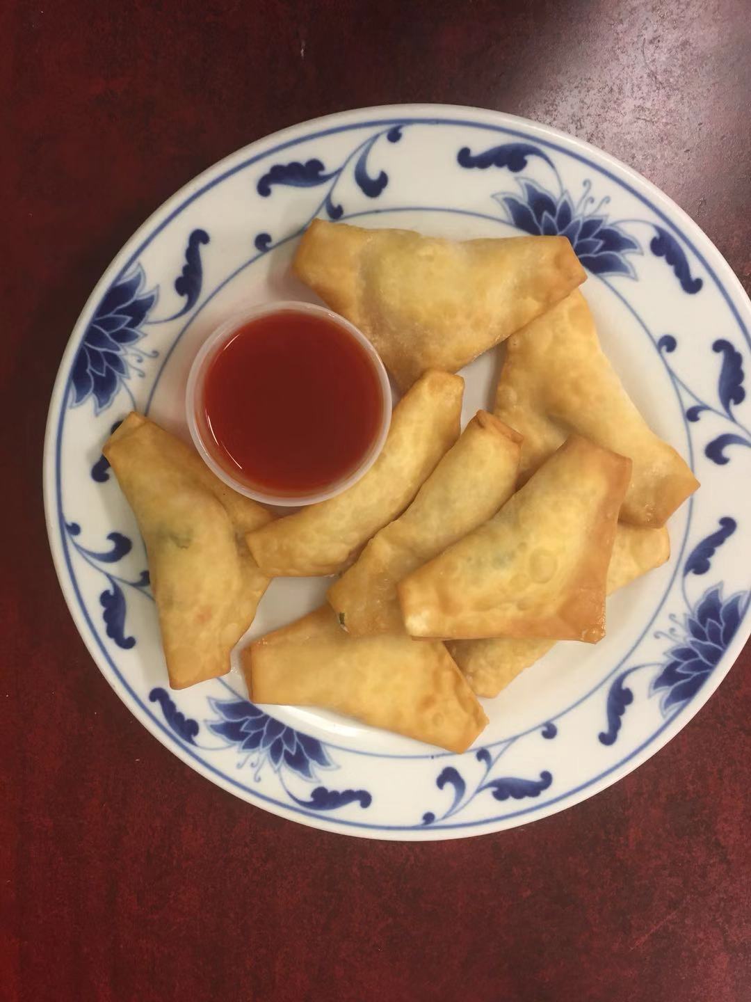 Order 8. Cheese Rangoon Crabmeat food online from Chin's Kitchen store, Alexandria on bringmethat.com