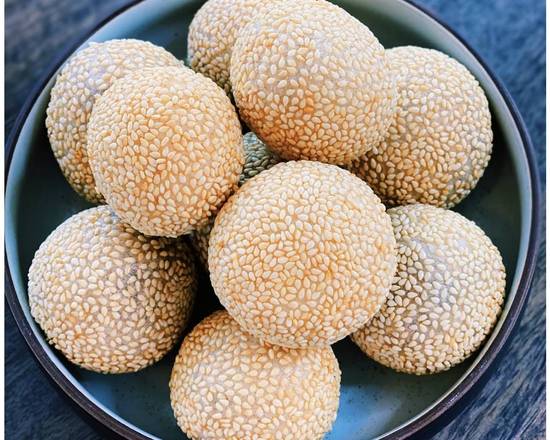 Order 8. Fried sesame ball food online from 135 Chinese Restaurant store, Lakewood on bringmethat.com