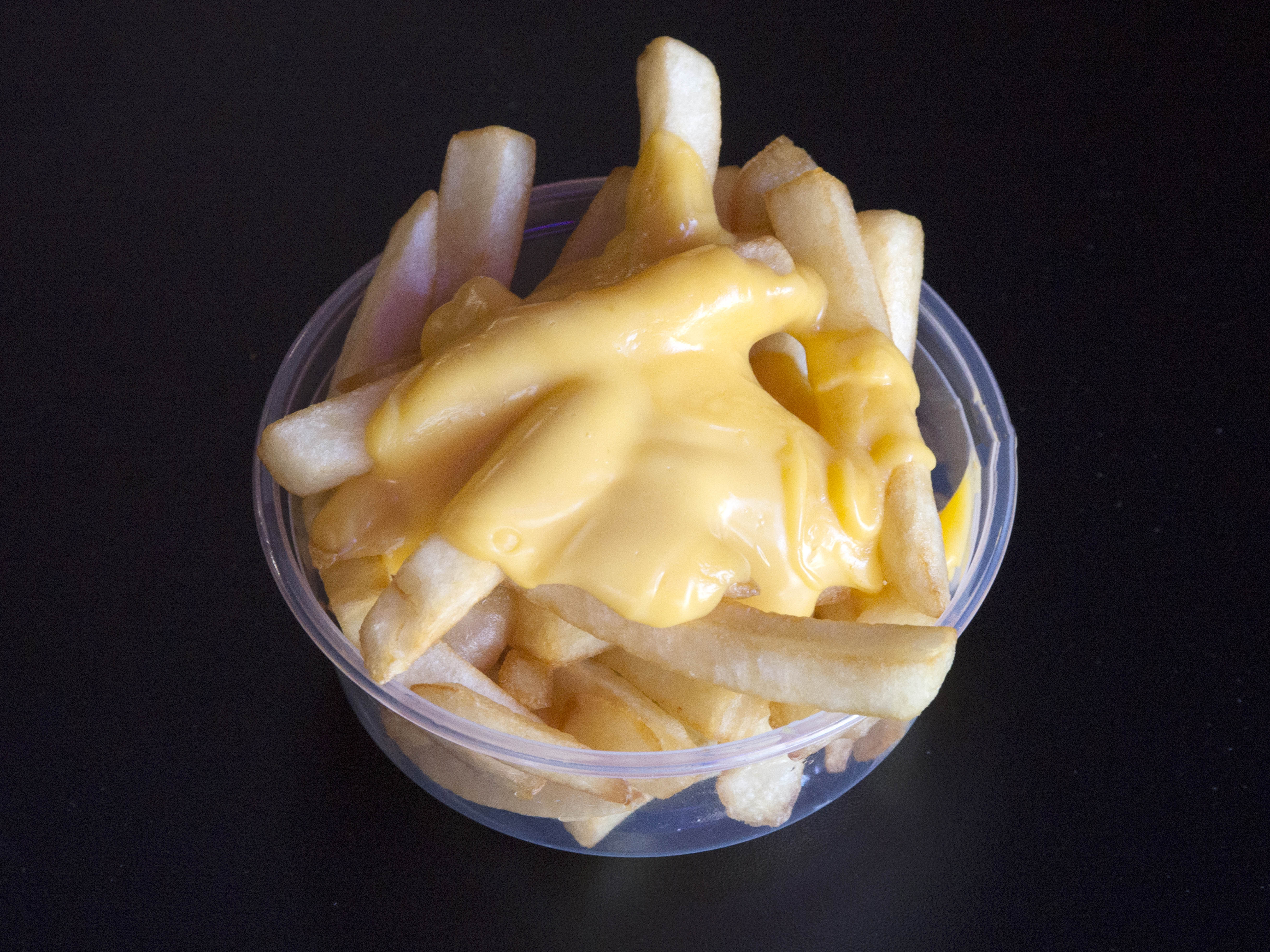 Order Cheese Fries food online from Stickies store, Albany on bringmethat.com