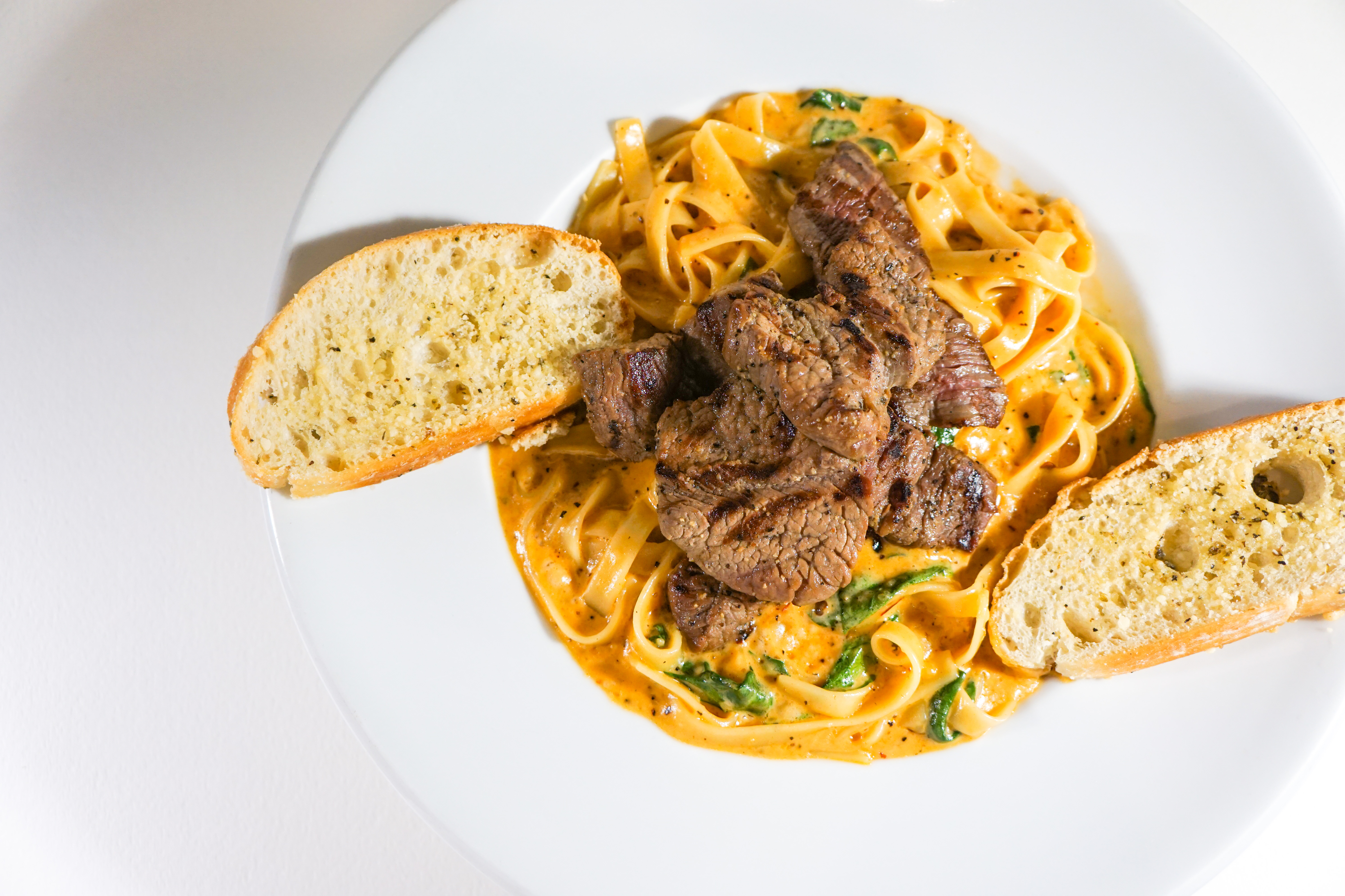 Order  Smoked Chipotle Beef Tenderloin Pasta food online from Mezza Grille store, Houston on bringmethat.com