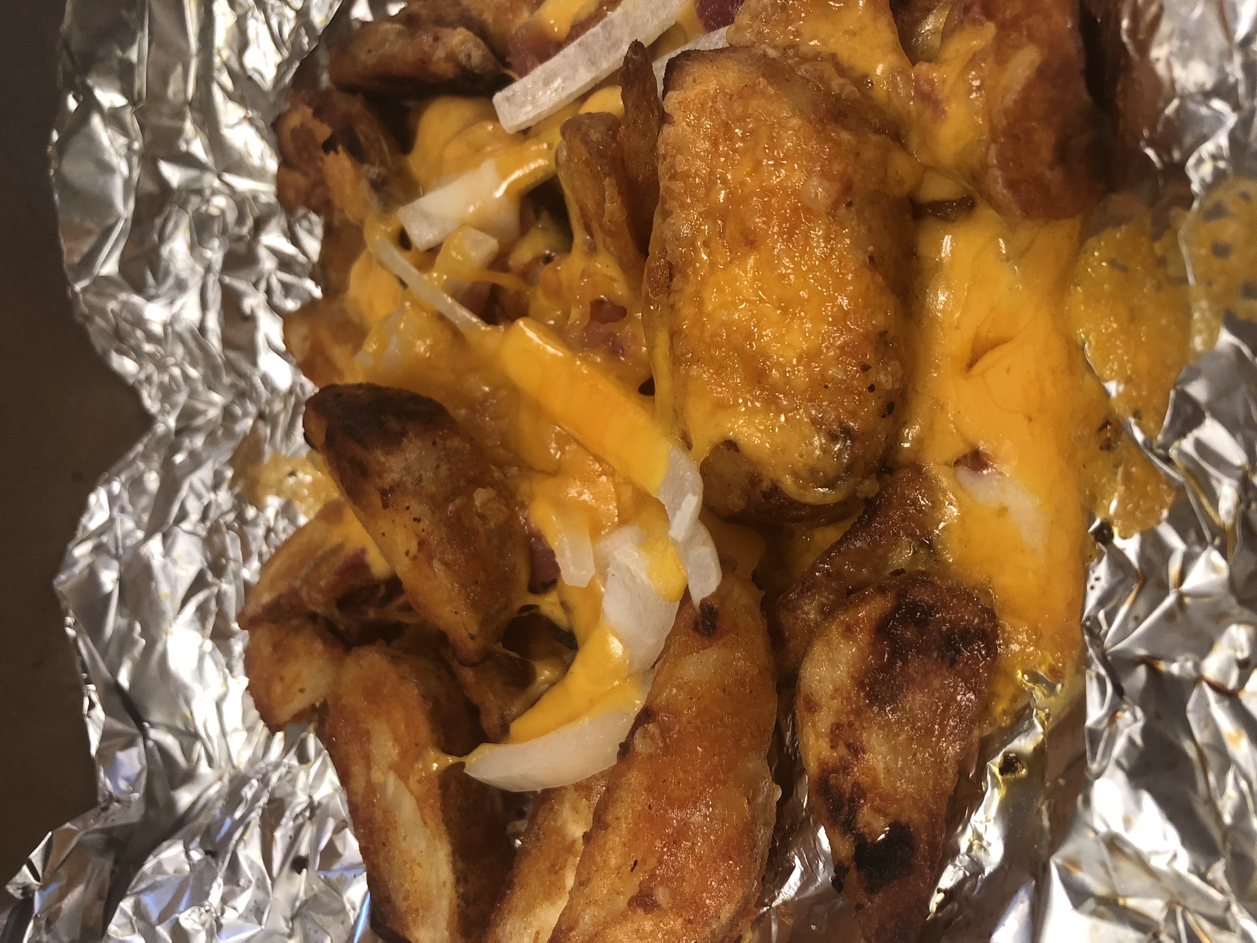Order Loaded Wedges food online from Romas Pizza store, Kalamazoo on bringmethat.com