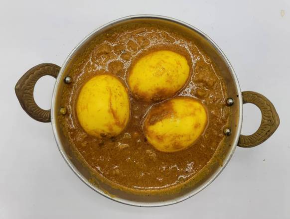 Order Egg Curry 16oz food online from Curry Point 2 Go store, Bellevue on bringmethat.com