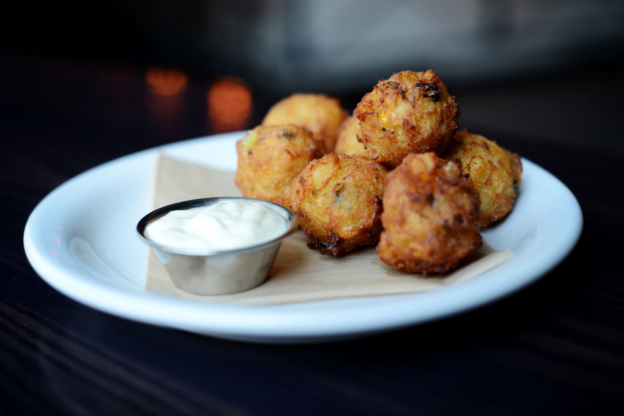 Order Lump Crab Hush Puppies food online from Conner Kitchen + Bar store, Indianapolis on bringmethat.com