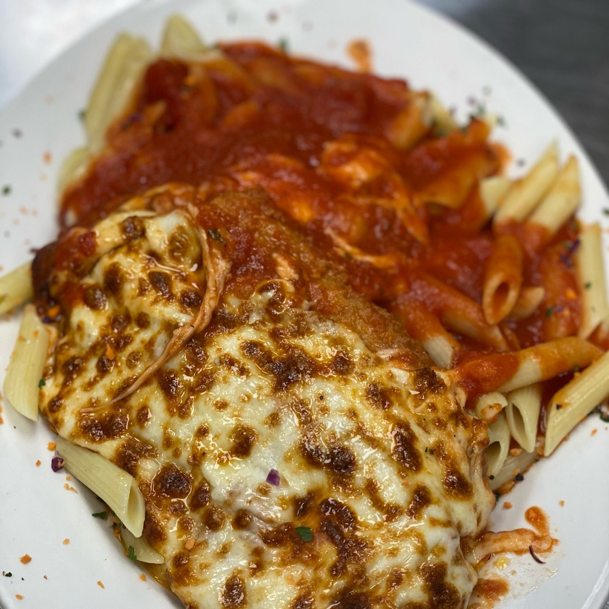 Order Chicken Parmigiana - Dinner food online from Cousins Pizza store, Norwood on bringmethat.com