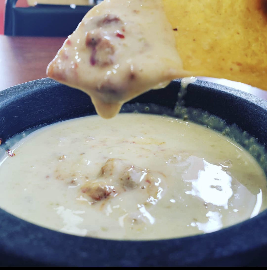 Order Choriqueso food online from Taqueria Mixteca store, Dayton on bringmethat.com