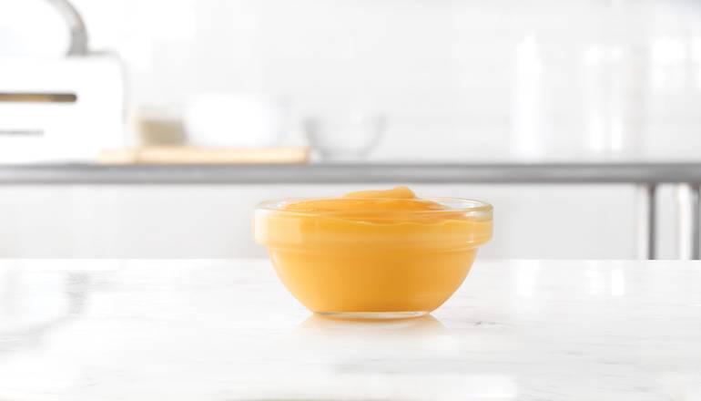 Order Cup of Cheddar Sauce food online from Arby store, Meadville on bringmethat.com