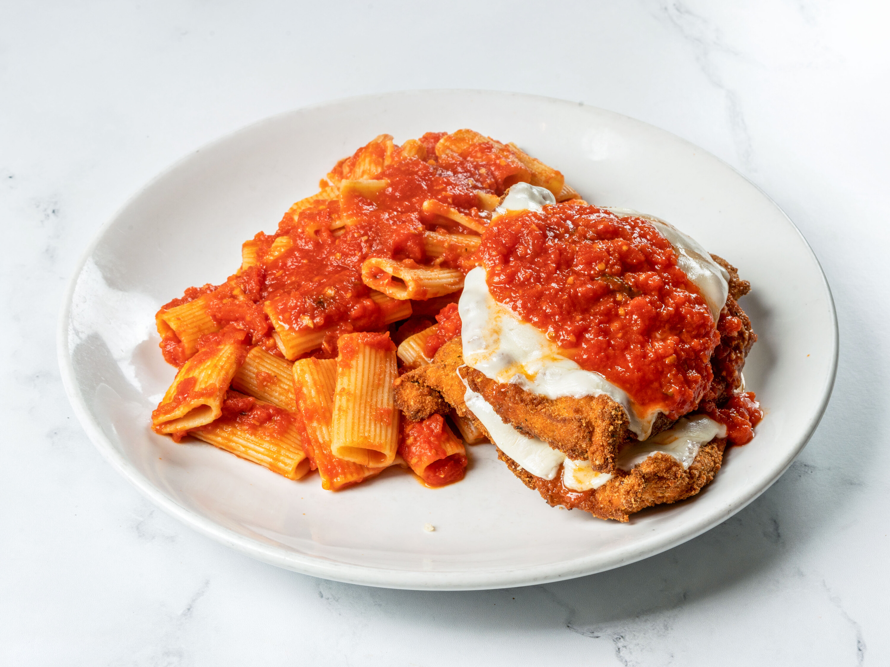 Order Chicken Parmigiana food online from Salvatore's Restaurant store, Lawrence on bringmethat.com