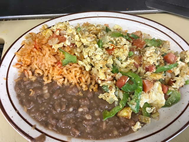 Order Mexican Style Breakfast 3 Eggs Peppers Onions Spanish Rice & Beans Tortilla food online from Jim's Burgers #2 store, Wilmington on bringmethat.com