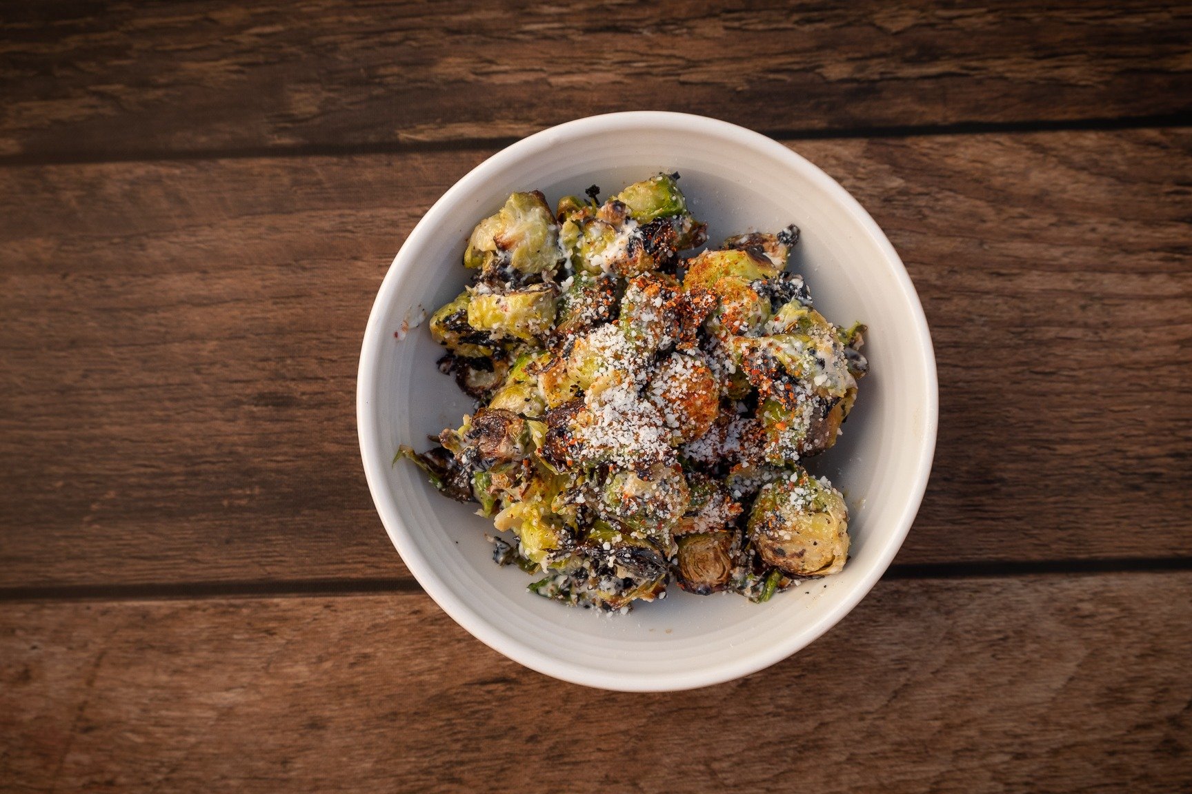 Order CHARRED BRUSSELS SPROUTS food online from Pitfire Artisan Pizza store, Los Angeles on bringmethat.com