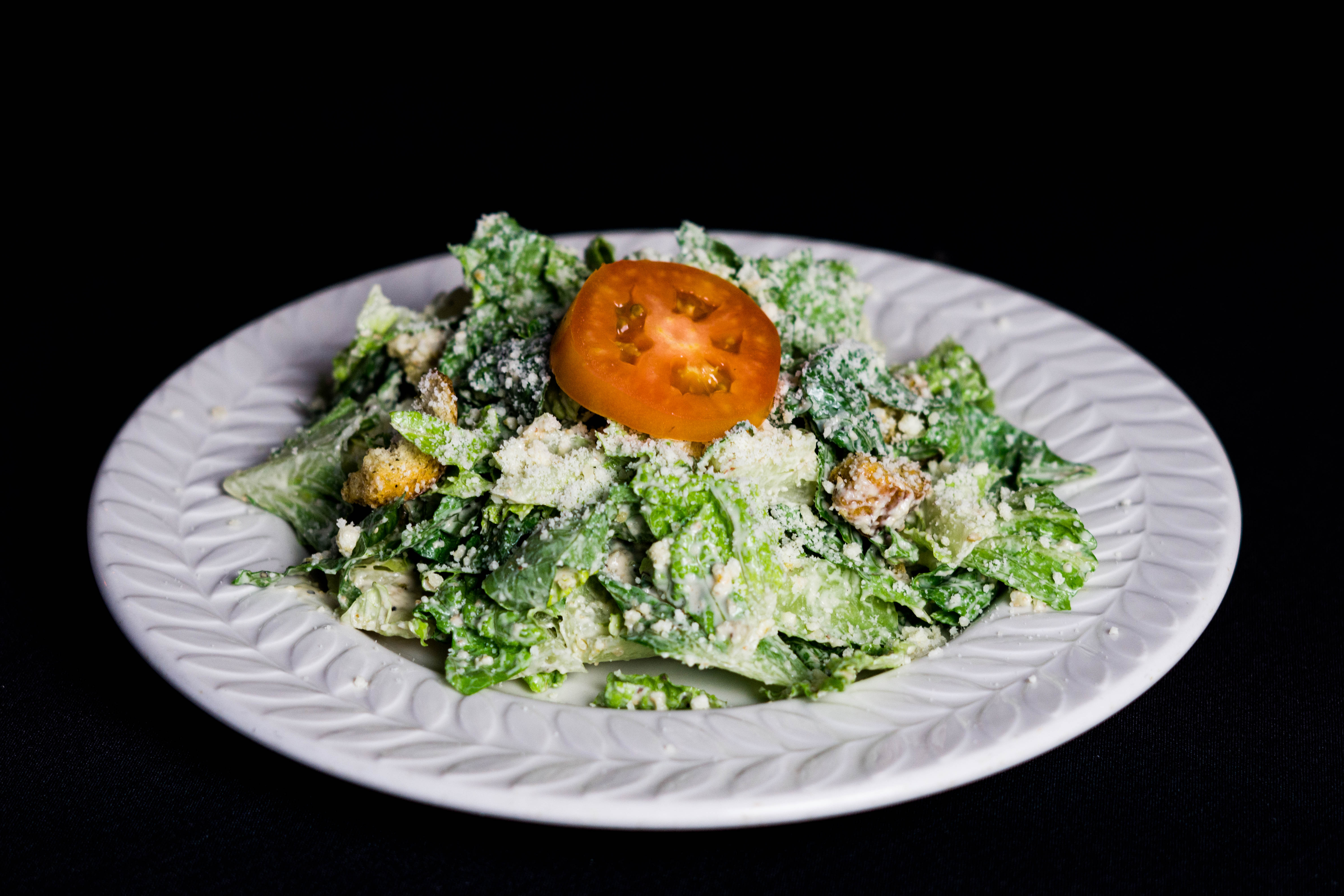 Order Caesar Salad food online from Andrea's Italian Restaurant store, Dallas on bringmethat.com