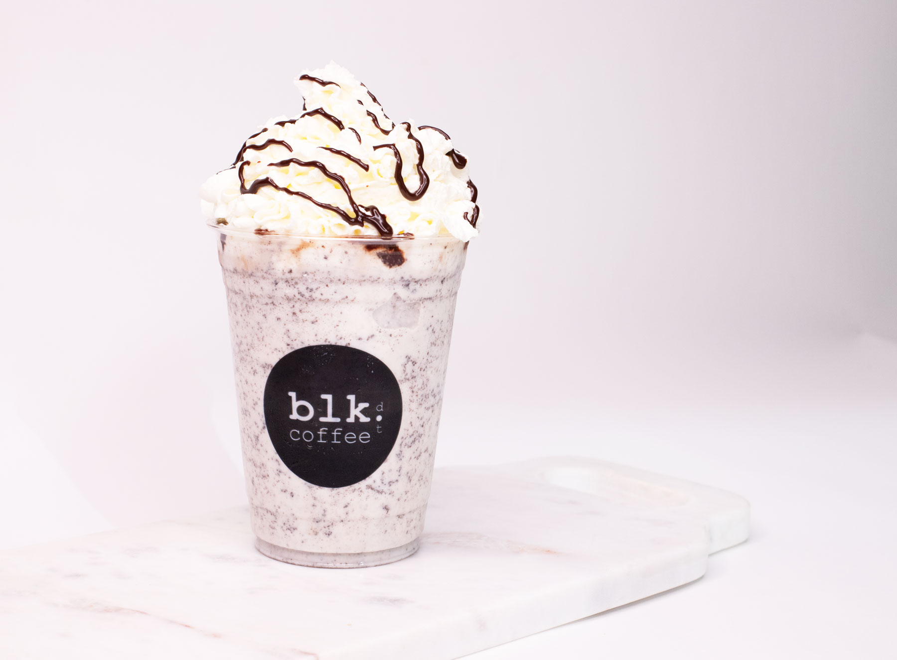 Order Oreo Cookies and Cream Frappe food online from Blk Dot Coffee store, Irvine on bringmethat.com
