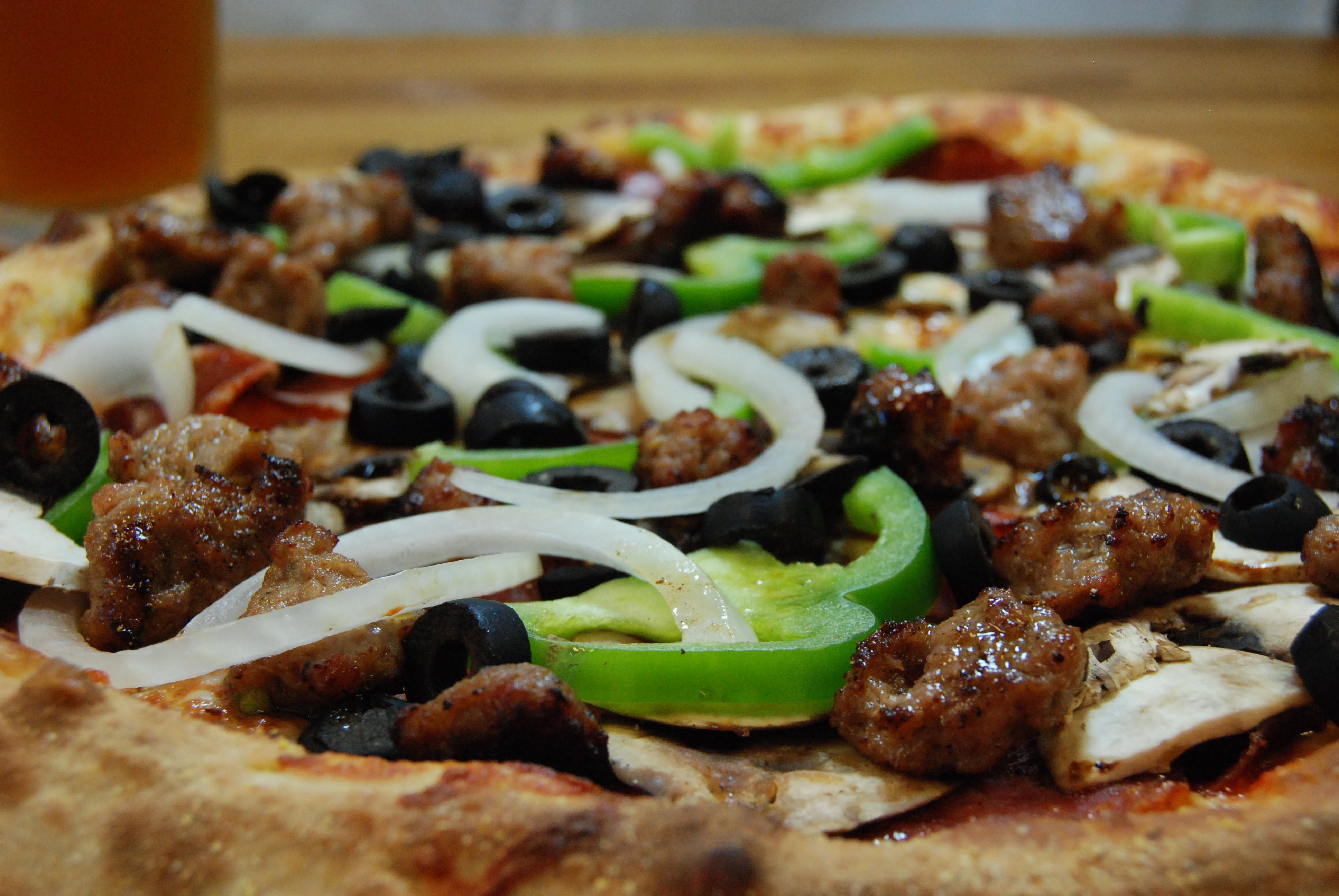 Order The Work's Pizza - Medium 12'' food online from Stefano Pizza store, Petaluma on bringmethat.com