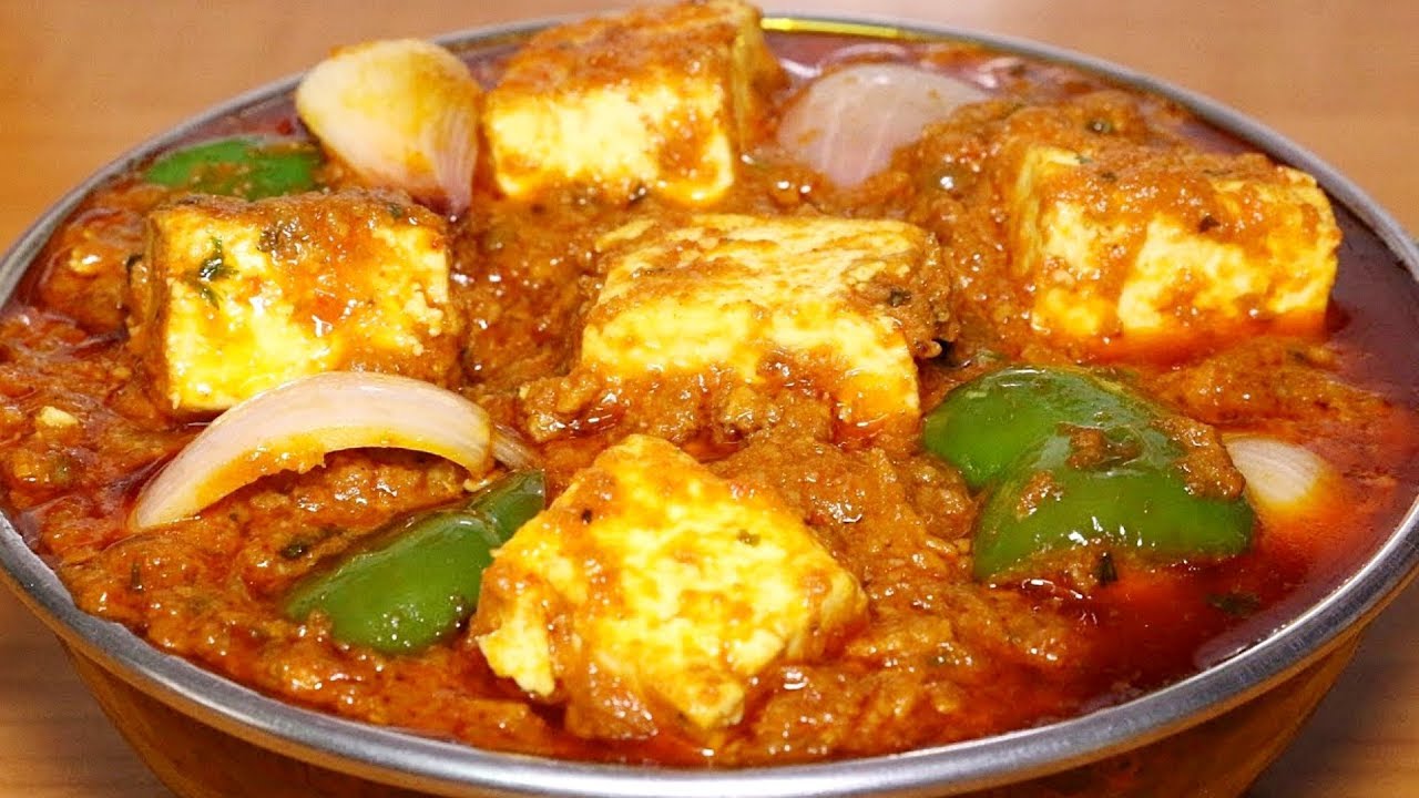 Order Paneer Tikka Masala with Garlic Naan food online from Gourmet India store, Houston on bringmethat.com