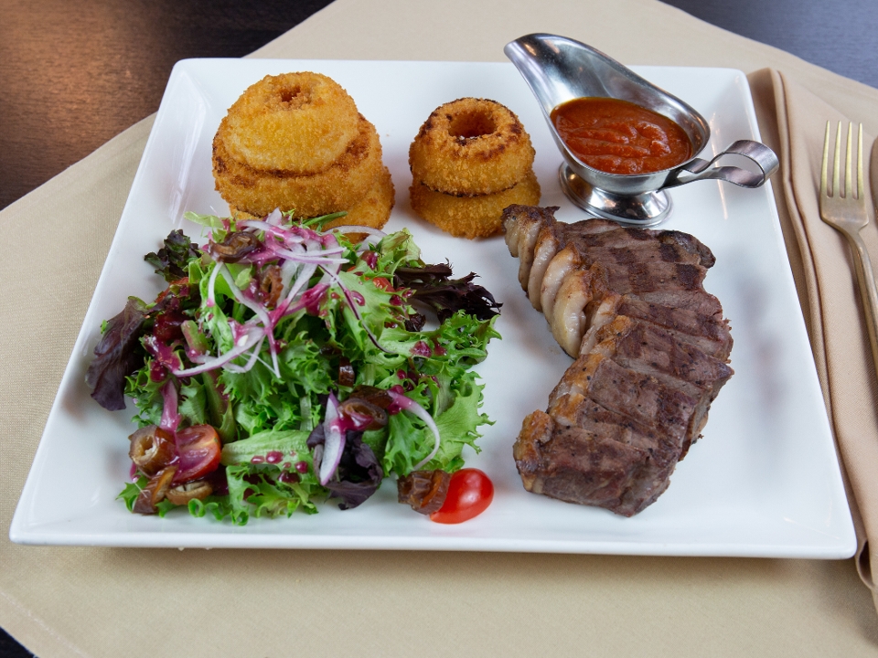 Order Peruvian Style NY Strip Steak food online from Teikoku Restaurant store, Newtown Square on bringmethat.com