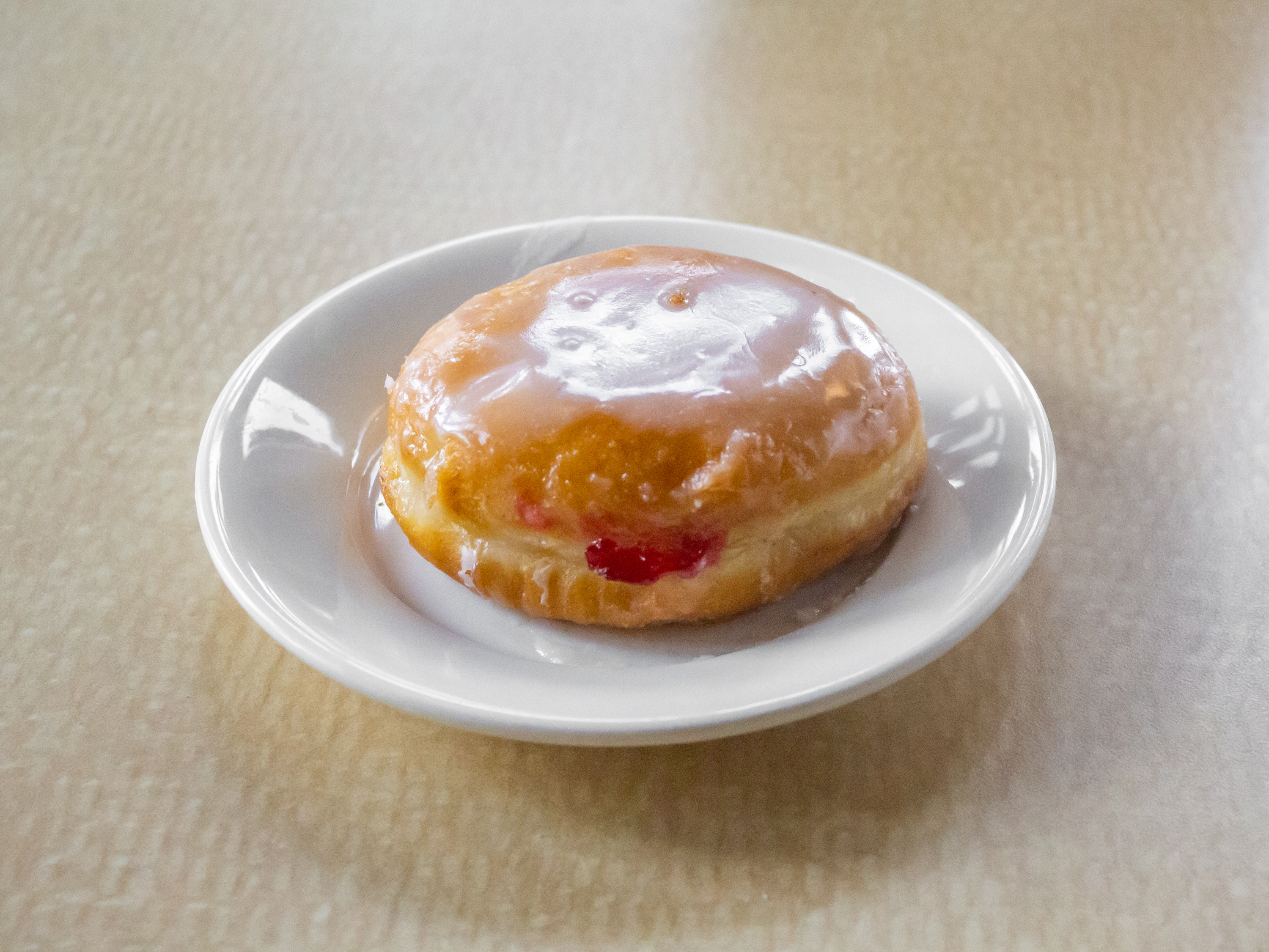 Order Raspberry filled donuts food online from 1872 Cafe store, Rochester on bringmethat.com