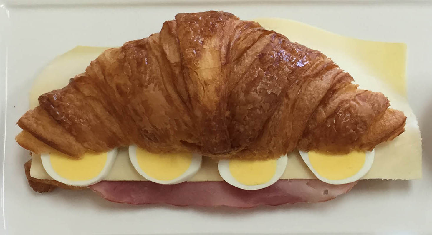 Order Ham, cheese & hard-boiled egg Croissant food online from Nanny's store, Las Vegas on bringmethat.com