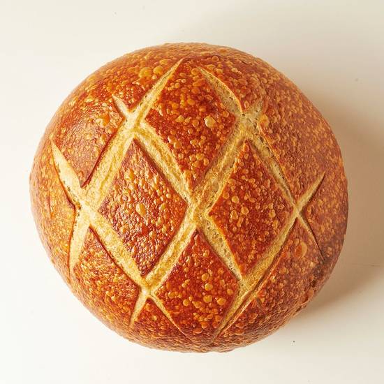 Order Sourdough Round (1 lb) food online from Boudin Bakery store, San Francisco on bringmethat.com