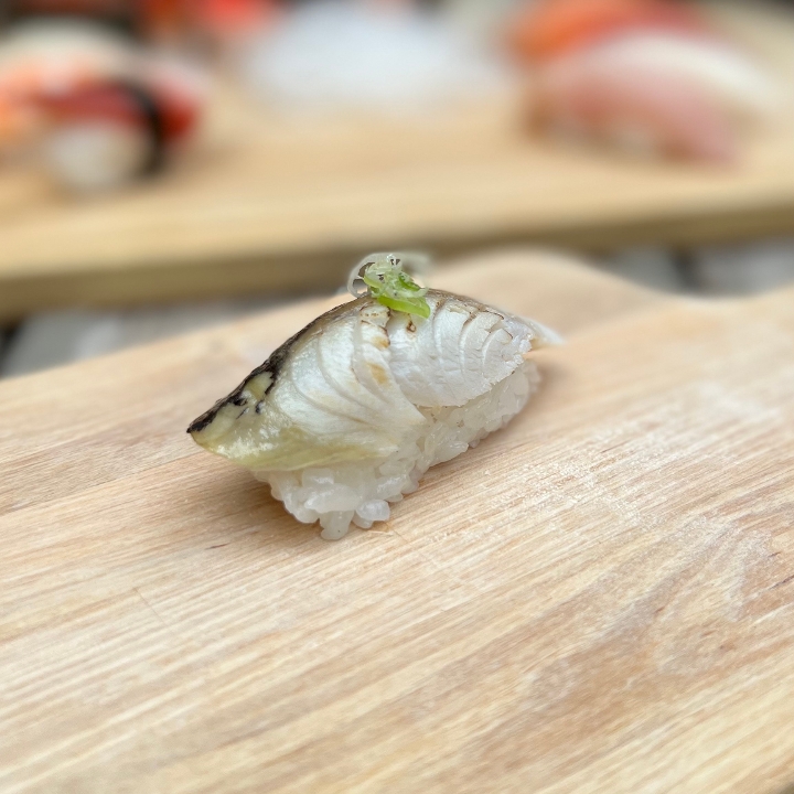 Order Saba Nigiri food online from Tanuki sushi store, Chicago on bringmethat.com