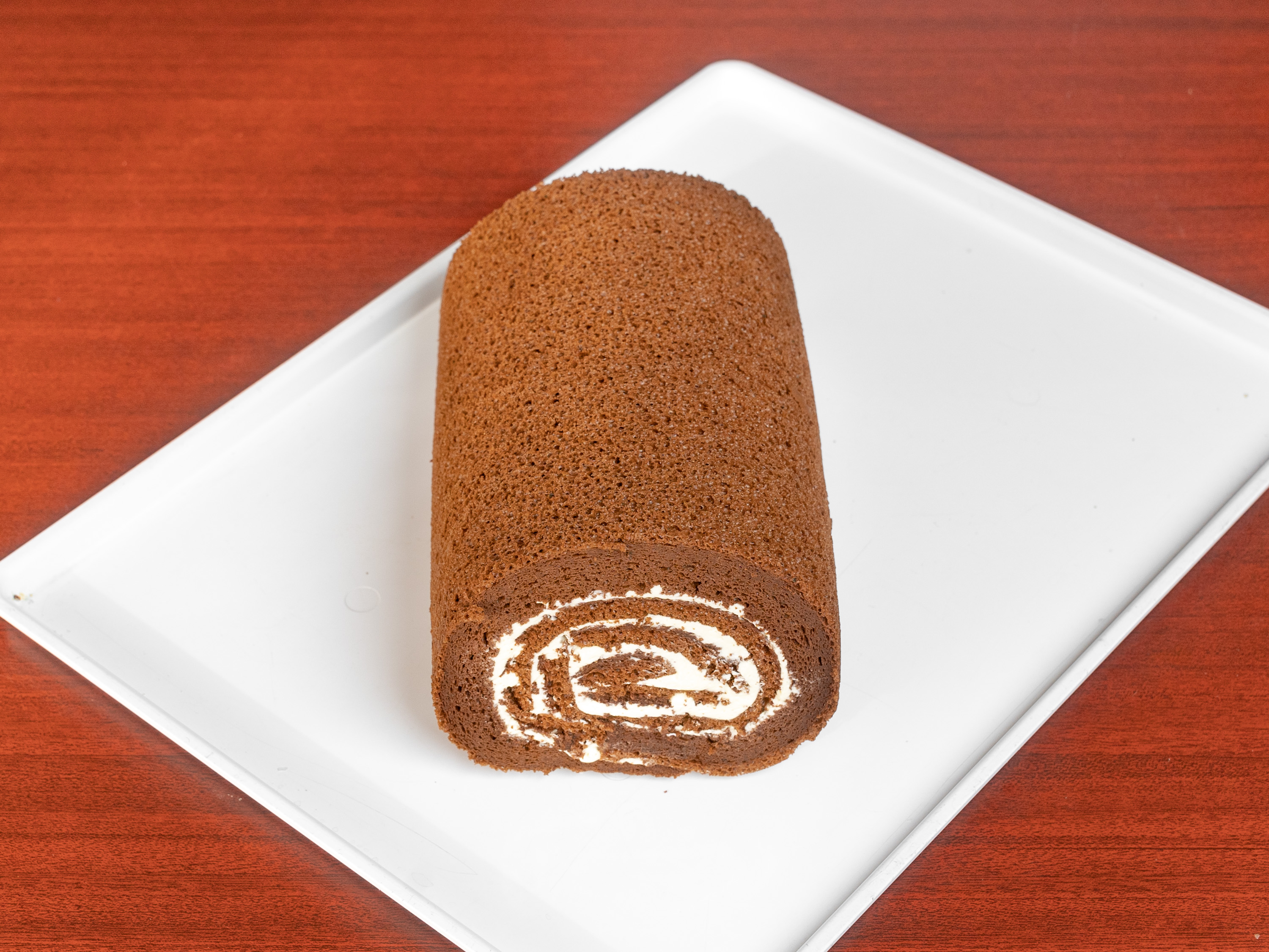 Order Whole Chocolate Swiss Roll food online from Cherry Blossom Bakery store, San Francisco on bringmethat.com