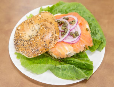 Order Nova Deluxe Sandwich - lox, cream cheese, tomato, onion, caper food online from Bread Brothers Bagel Cafe store, Brooklyn on bringmethat.com