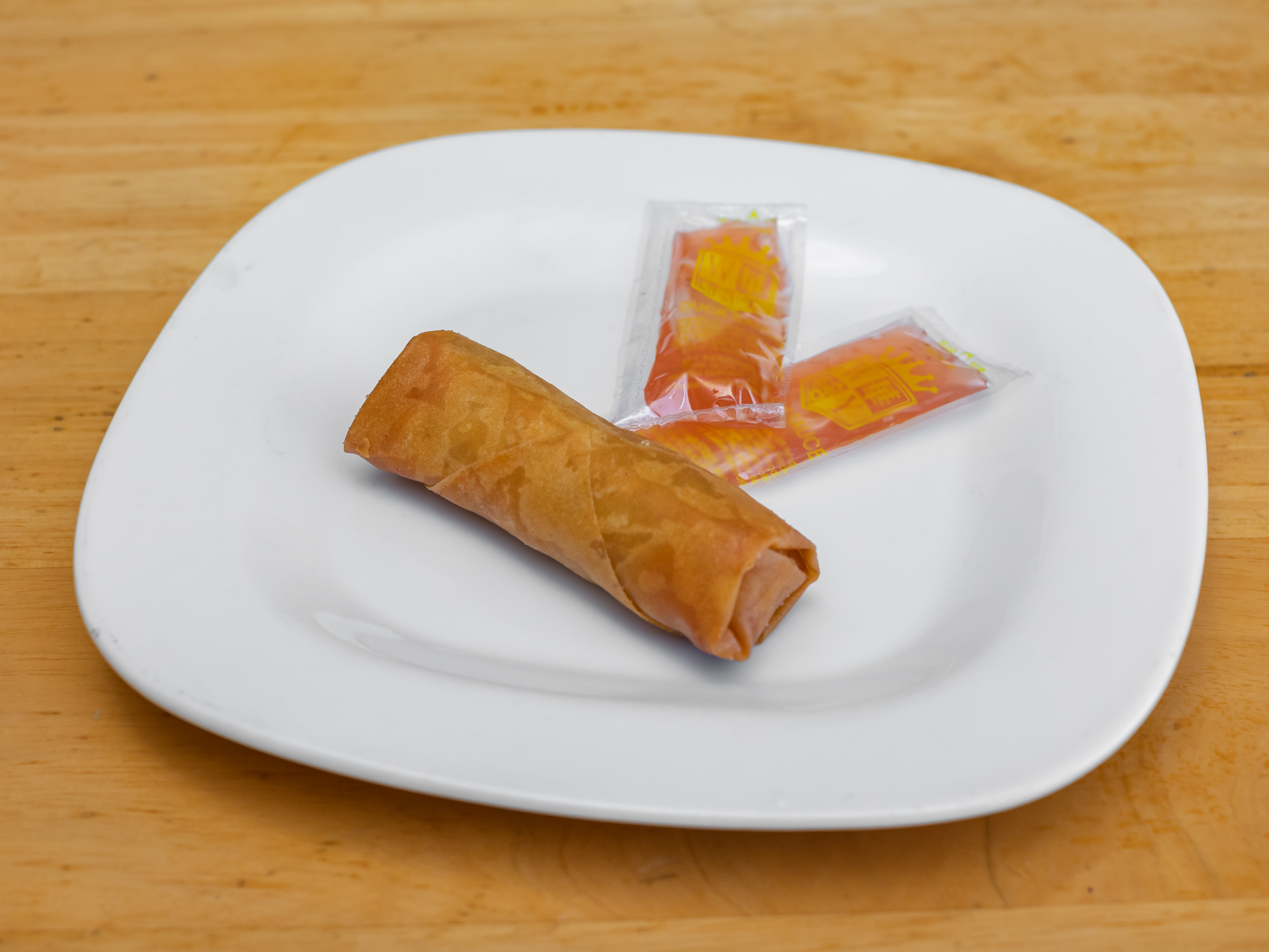 Order A2. Shrimp Spring Roll food online from Rice King Chinese Restaurant store, Toledo on bringmethat.com