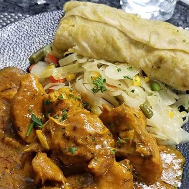 Order Caribbean Roti food online from Blue Waters Caribbean & Seafood Grill store, Temple Hills on bringmethat.com