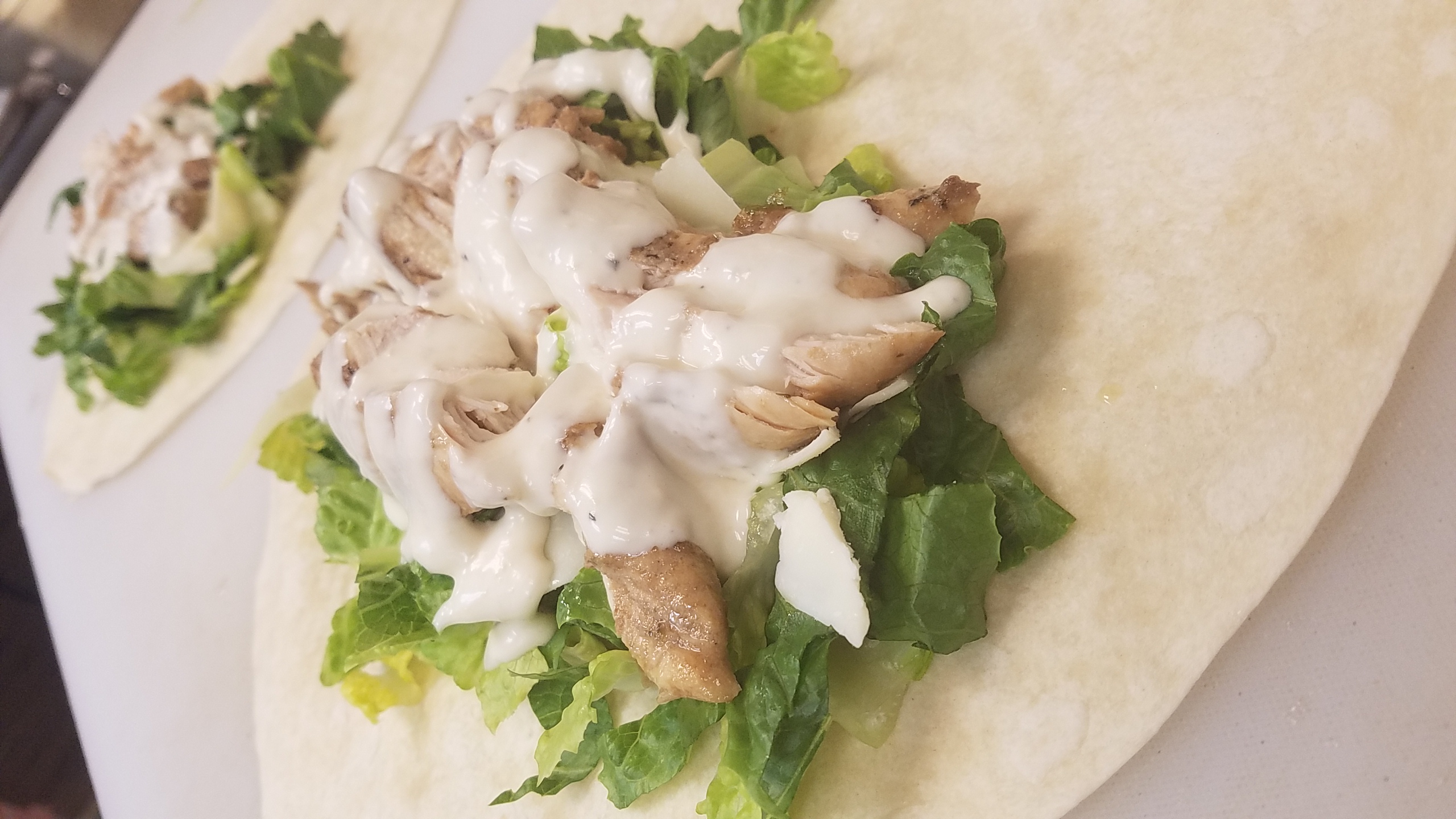 Order Chicken Caesar Wrap food online from Gregory House Of Pizza store, Belmont on bringmethat.com