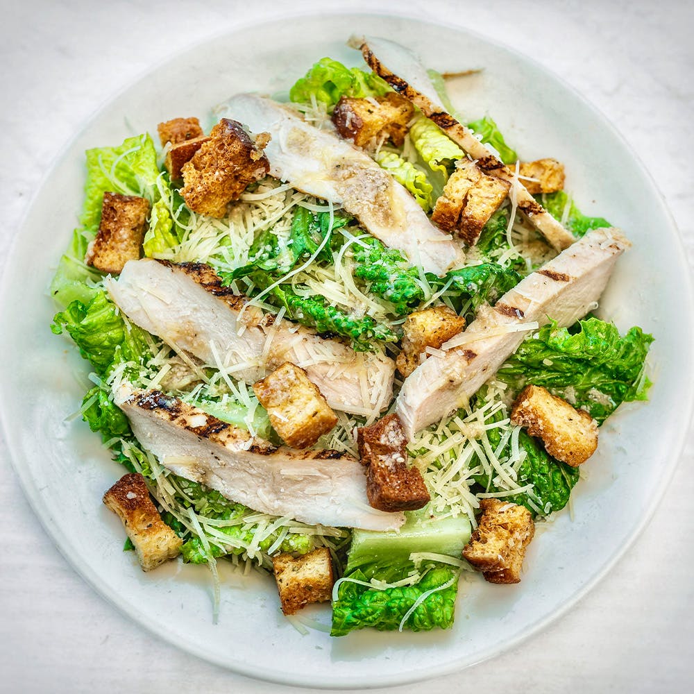 Order Chicken Caesar Salad - Side food online from Amici's East Coast Pizzeria store, Mountain View on bringmethat.com