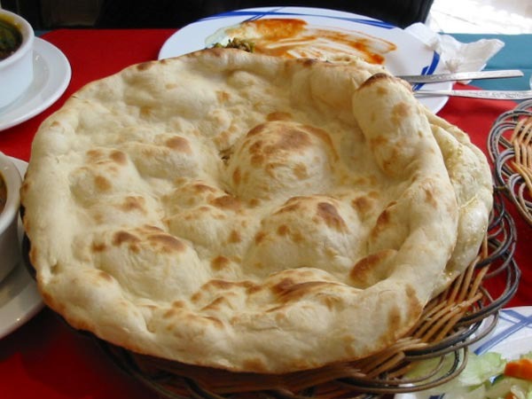 Order Plain Naan food online from Swad Indian and Nepalese Cousine store, Fort Worth on bringmethat.com