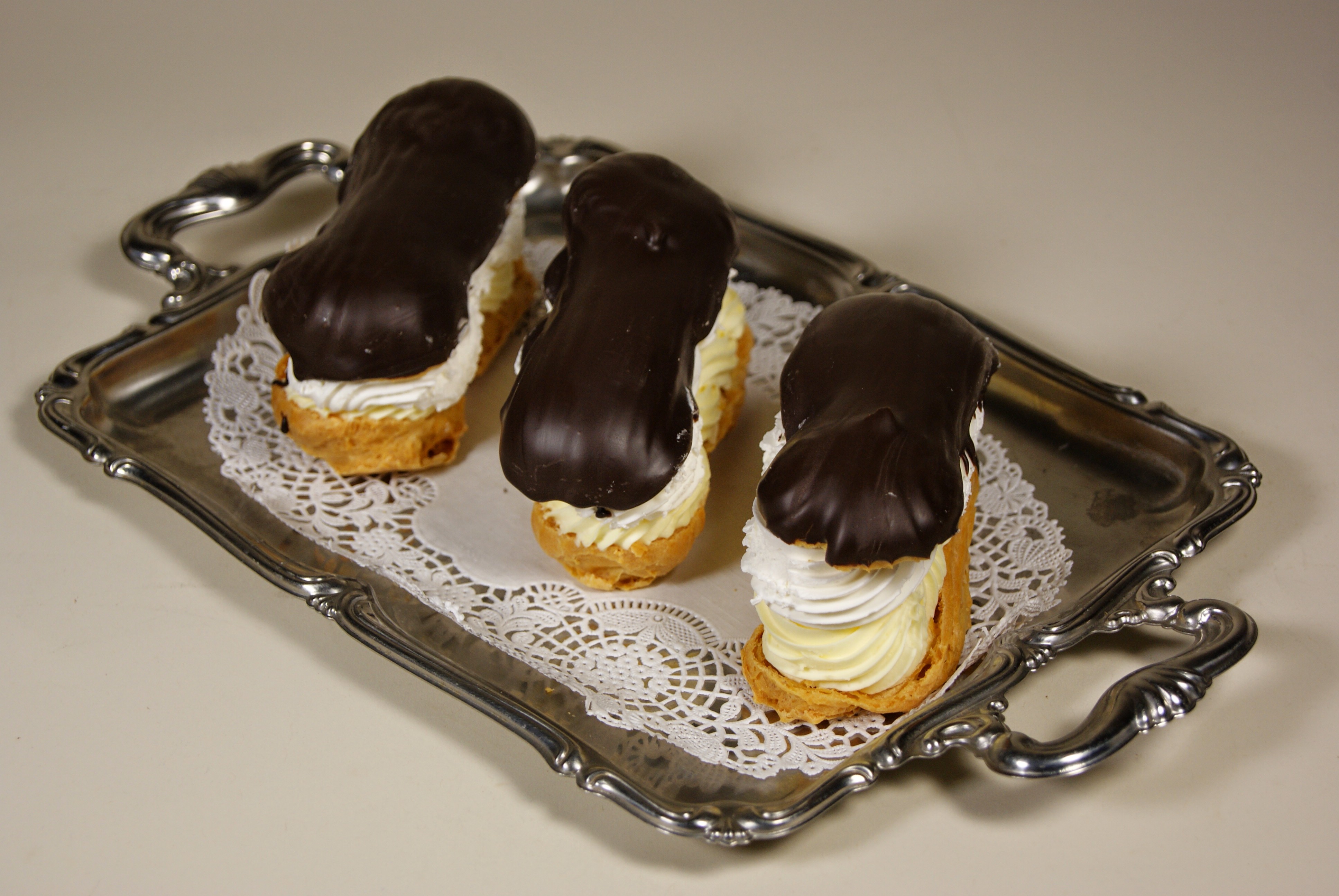 Order Chocolate Eclair food online from Lutz Cafe & Pastry Shop store, CHICAGO on bringmethat.com