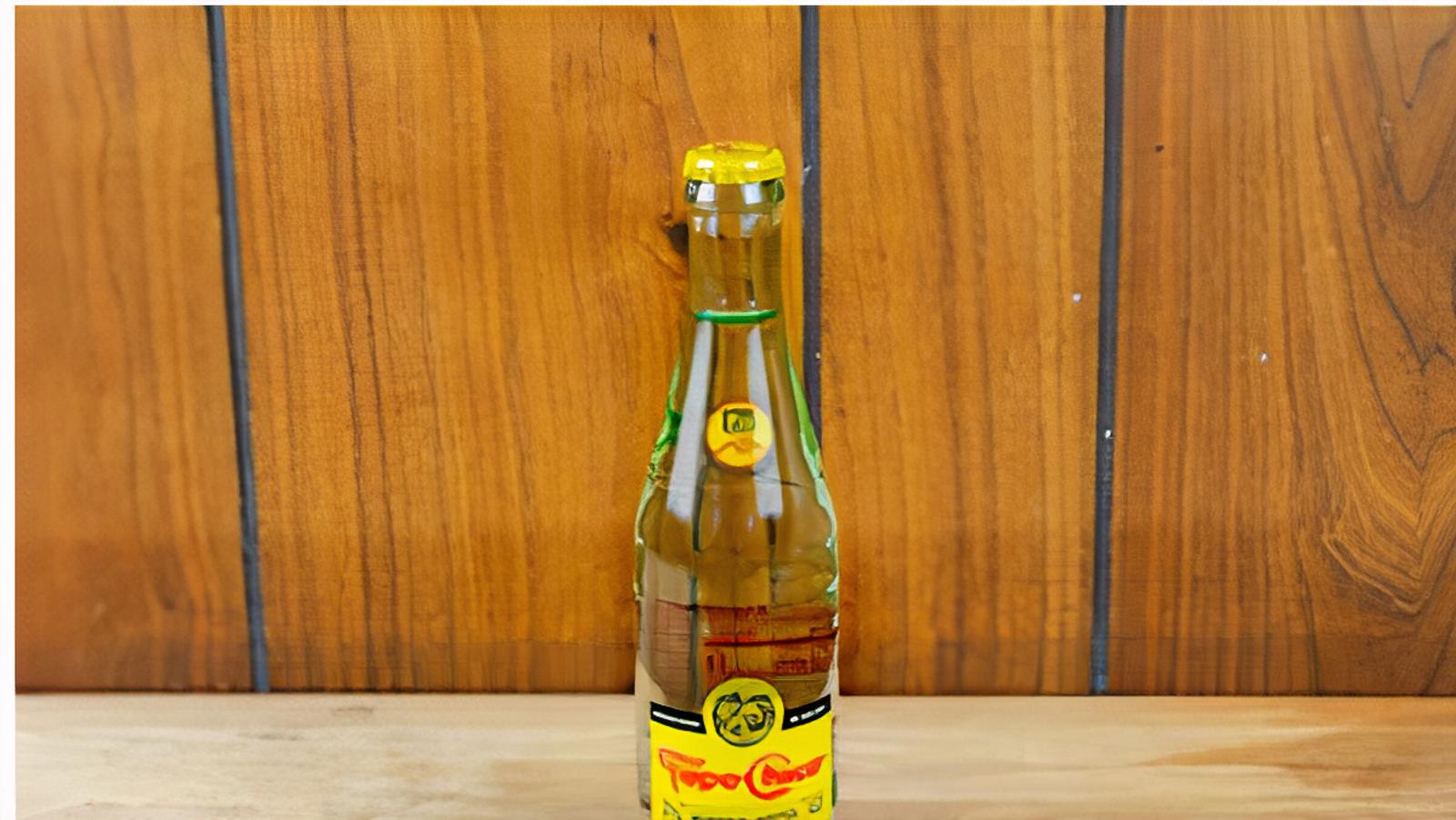 Order Topo Chico food online from Toto's Pizzeria & Restaurant store, Belmont on bringmethat.com