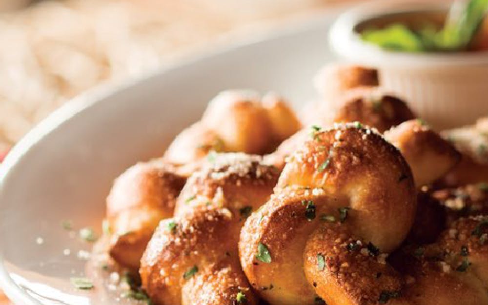 Order Garlic Knots - 10 Pieces food online from Russo New York Pizzeria store, Houston on bringmethat.com