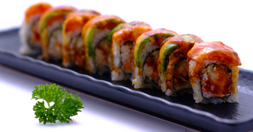 Order Flaming Rainbow Roll food online from Yoshi store, Houston on bringmethat.com
