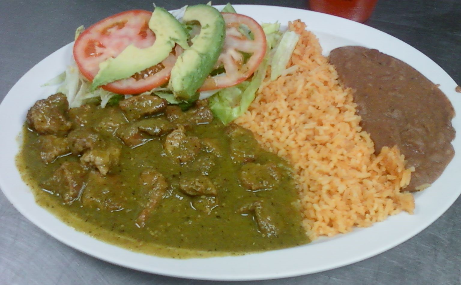 Order Chile Verde food online from Three Brothers Tacos store, Palo Alto on bringmethat.com