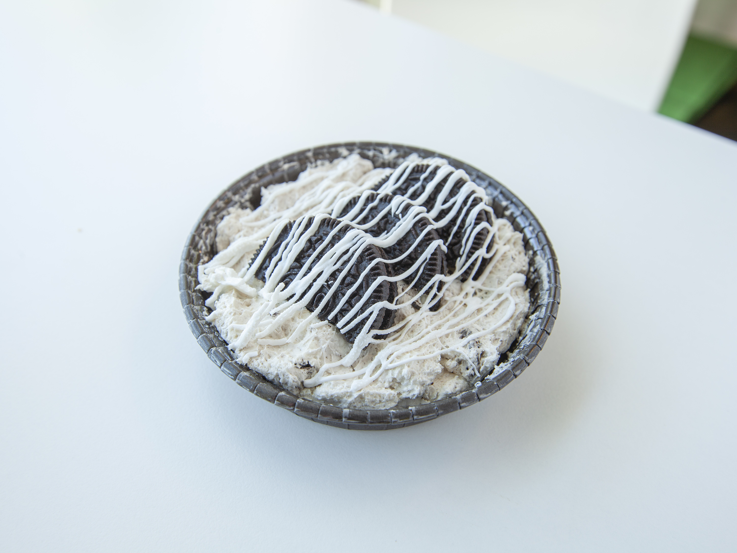 Order 4" Mini Oreo Overload Cheesecake food online from The Dessert Stand store, Westminster on bringmethat.com