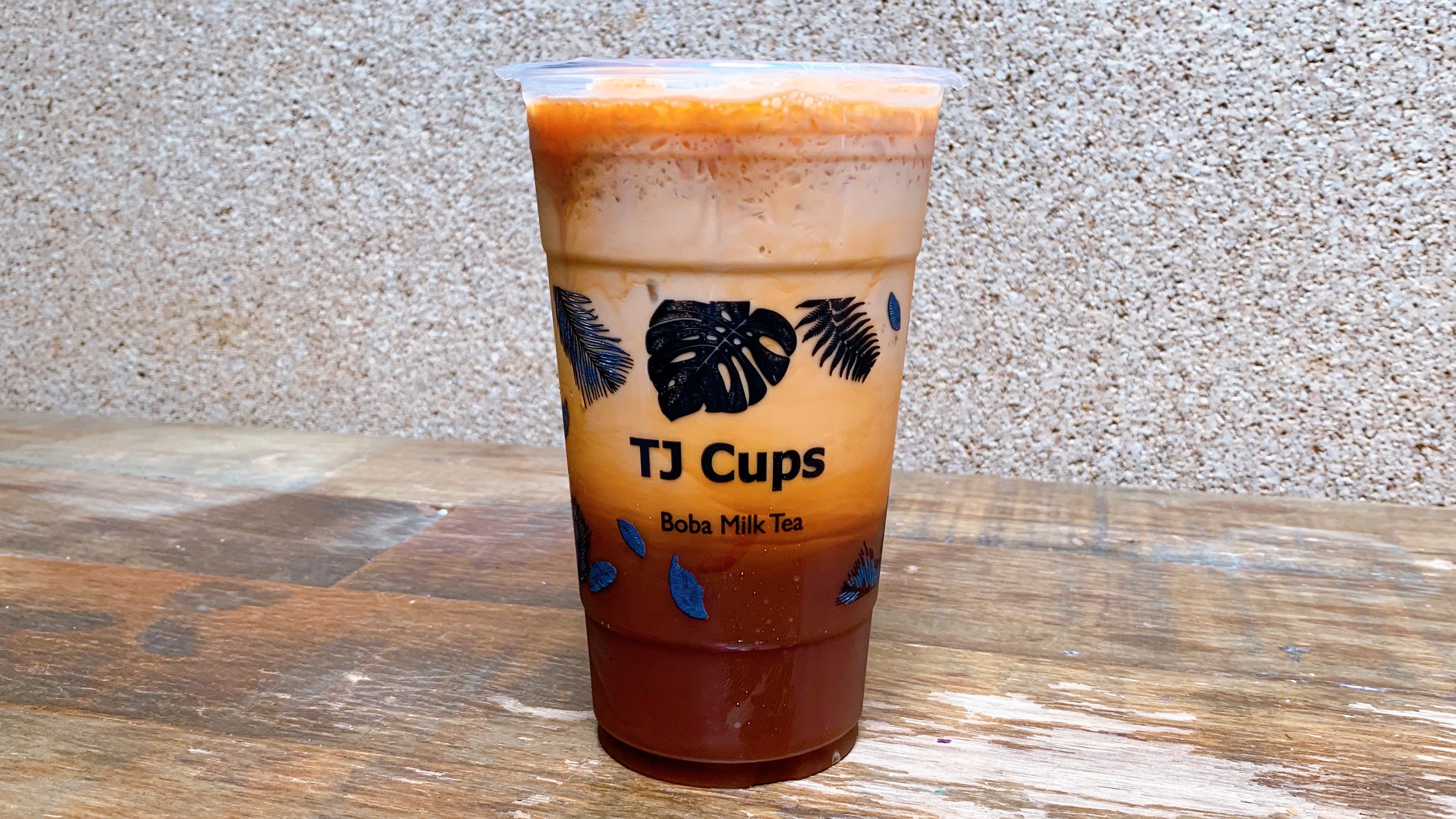 Order Premium Thai Iced Tea food online from TJ Cups store, San Francisco on bringmethat.com