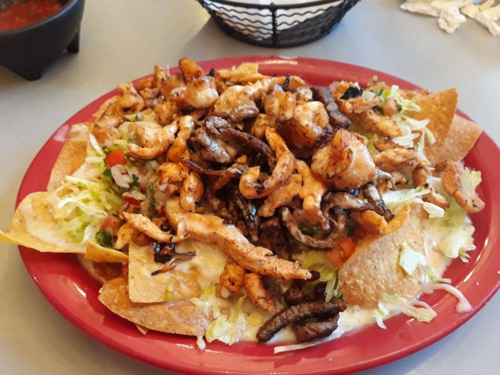 Order Nachos Carbon food online from Iguana Mexican Restaurant Bar & Grill store, Brownsburg on bringmethat.com