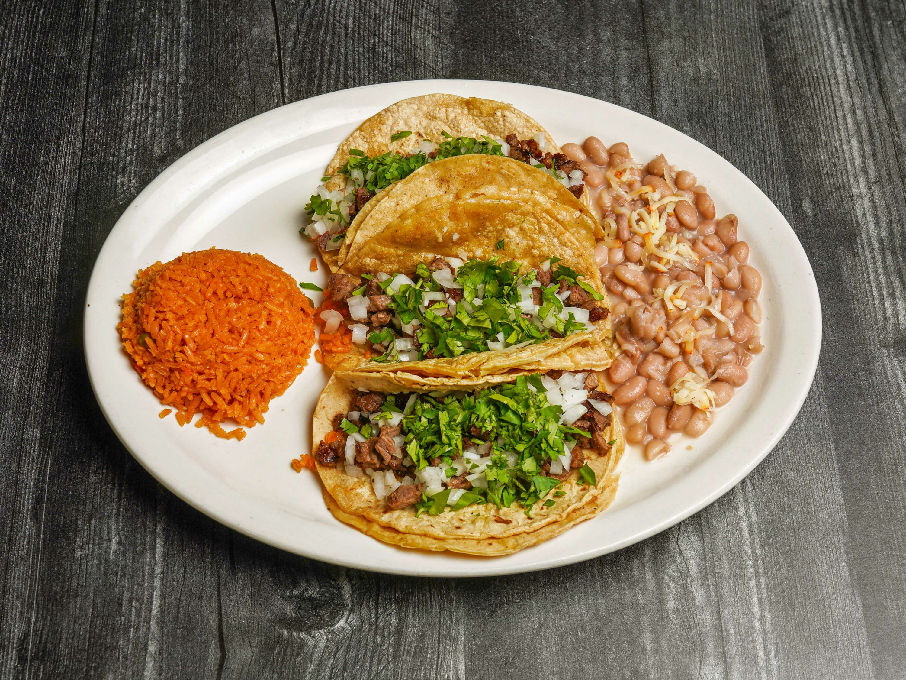 Order 10. 3 Taco Dinner food online from El Chile Restaurant and Pancake House store, Chicago on bringmethat.com